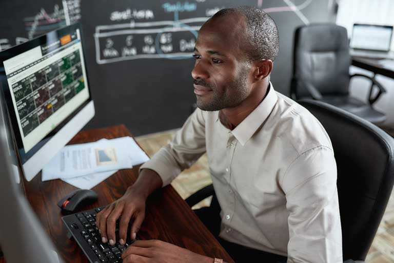 black business man at computer